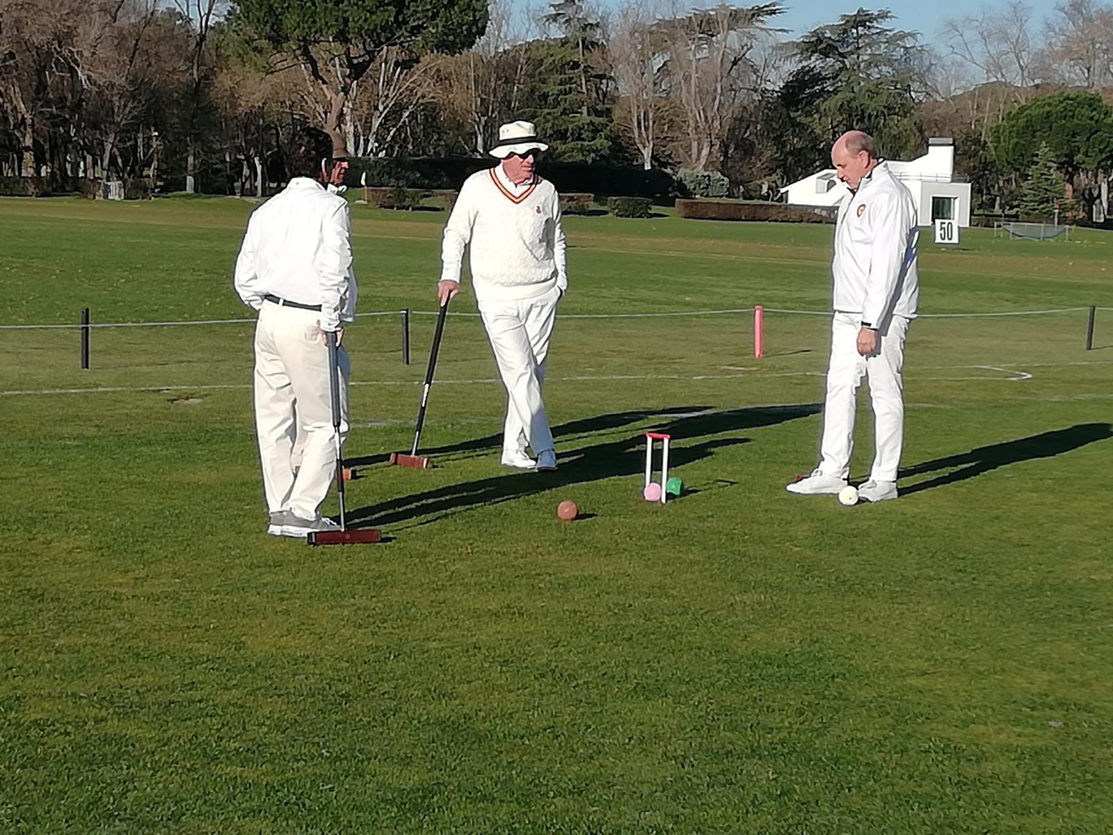 Partido de croquet en el Club de Campo.